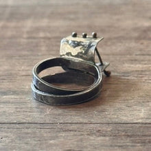 Load image into Gallery viewer, Sterling silver patina ring with small bars across open section of ring
