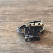 Load image into Gallery viewer, Sterling silver patina ring with small bars across open section of ring
