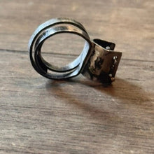 Load image into Gallery viewer, Sterling silver patina ring with small bars across open section of ring
