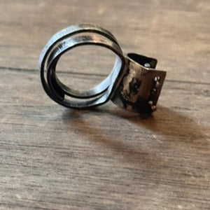 Sterling silver patina ring with small bars across open section of ring